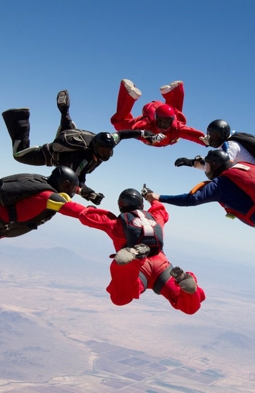 People are skydiving