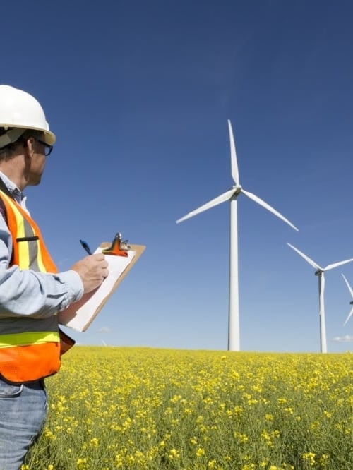 Inspector at work at wind turbines