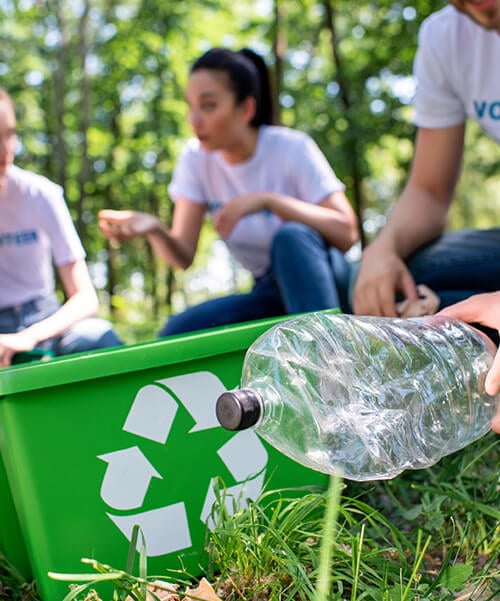 Group of people clean up garbage for recycling